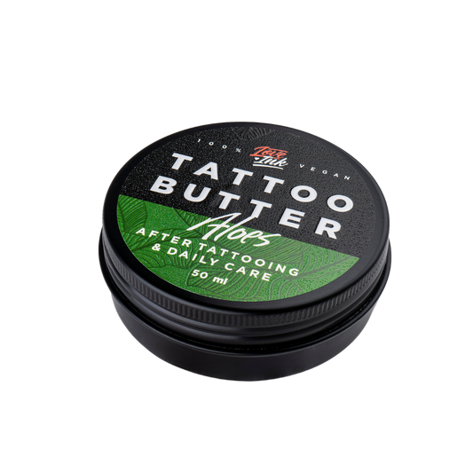 Packshot of Love Ink Tattoo Butter Aloe tin, slightly angled, labeled for after tattooing and daily care, 50 ml.